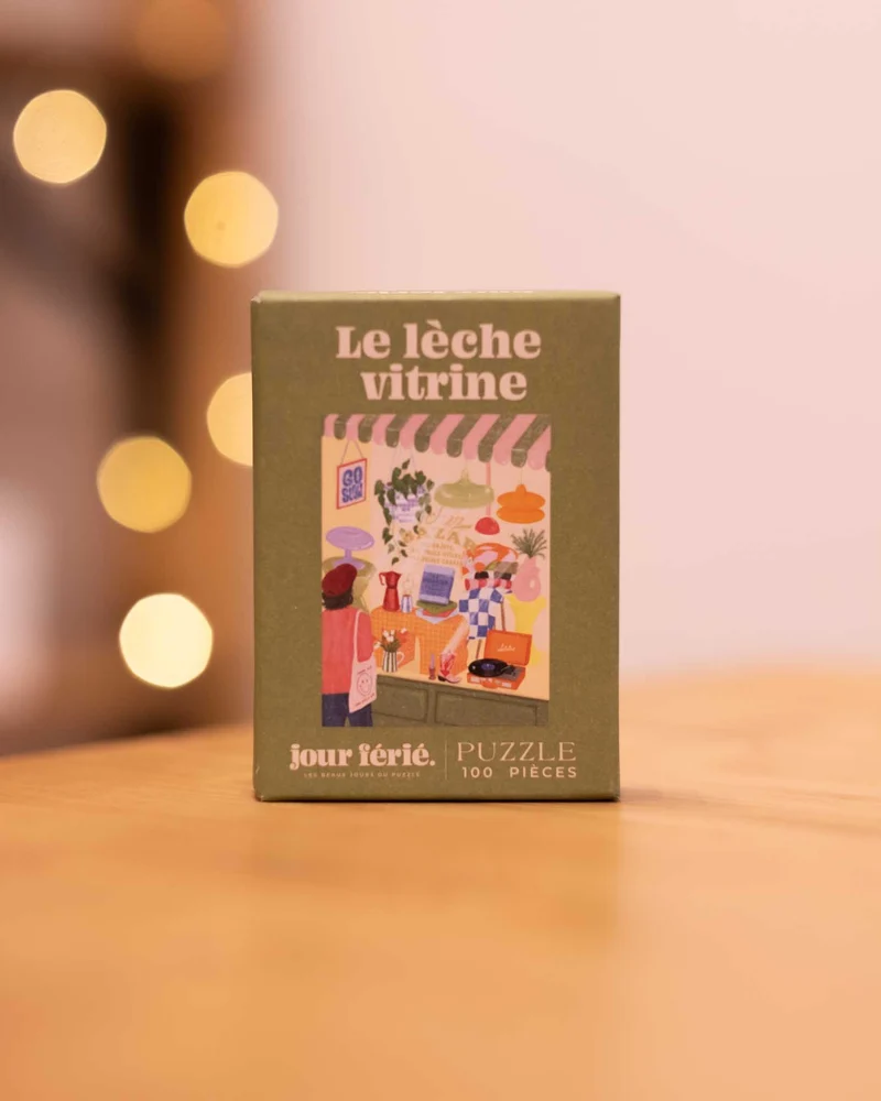 Puzzle - 100 pièces - Le lèche vitrine (n°1)